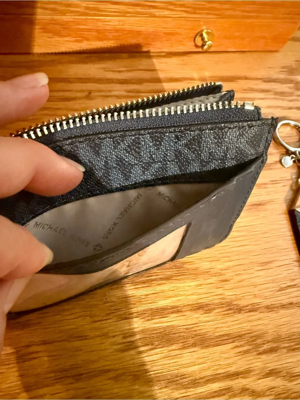 Michael Kors Navy Monogram Card Holder with silver tone purse charm